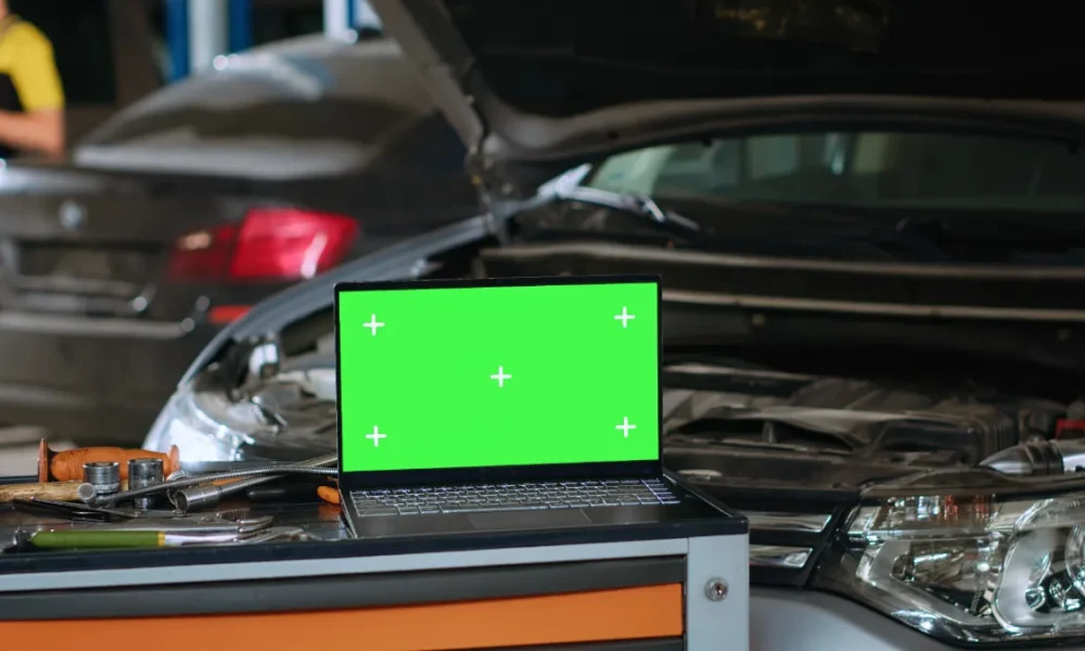 green-screen-laptop-in-auto-repair-shop-2026-01-08-02-31-00-utc